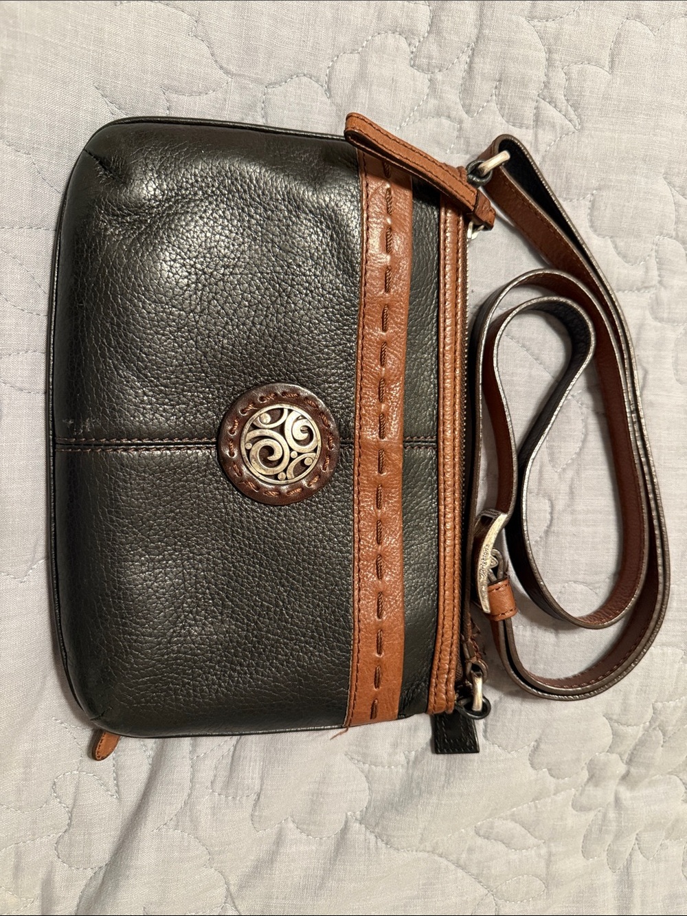 Brighton- Women's Black and Brown Leather Crossbody Bag with Decorative Medallio